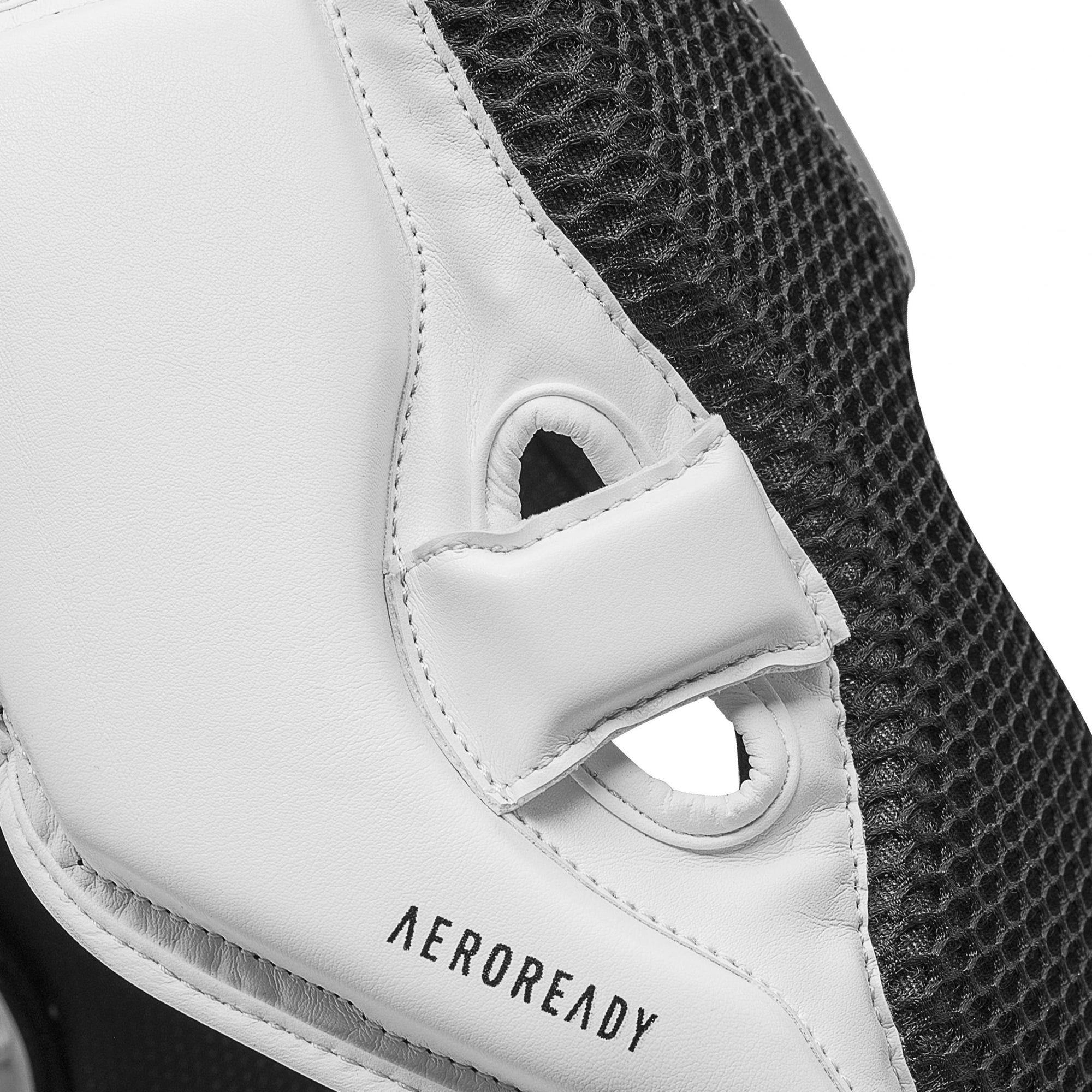 Close-up of black and white knee pad for boxing protection.