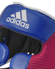 Close-up of Adidas Hybrid 150 boxing helmet, red/white, size M.