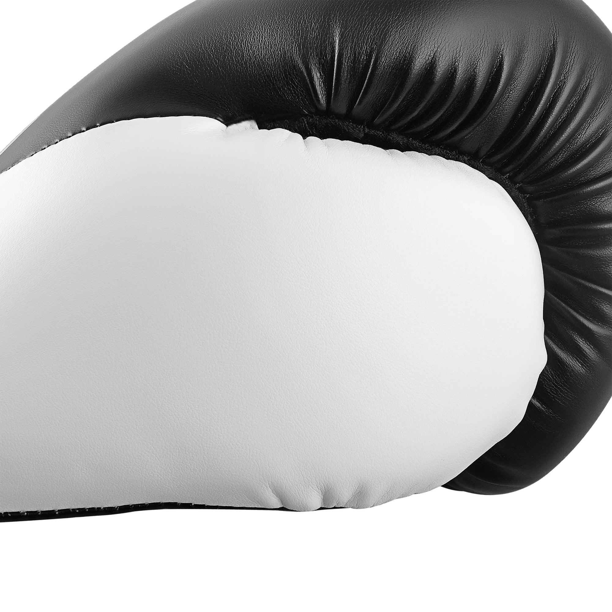 Close-up of black and white boxing glove by Adidas Hybrid 150.