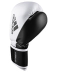 Black and white adidas Hybrid 150 boxing glove.