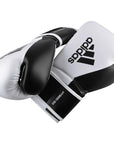 White and black Adidas Hybrid 150 training gloves.