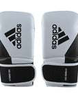 Pair of white and black Adidas Hybrid 150 boxing gloves.