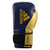 A blue and gold adidas boxing glove.