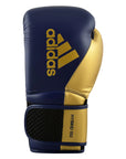 A blue and gold adidas boxing glove.