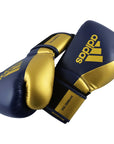 Blue and gold Adidas Hybrid 150 women's training gloves pair.