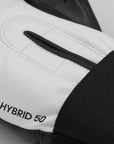 Close-up of adidas Hybrid 50 boxing glove in black and white.