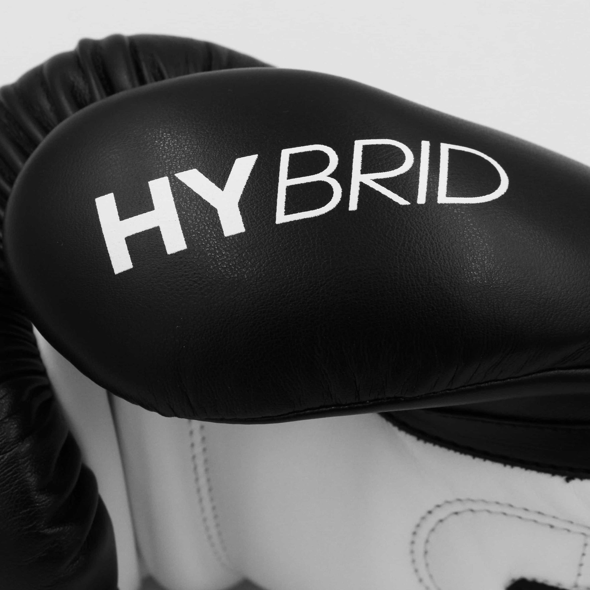 Close-up of a black and white adidas boxing glove.