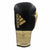 Single black and gold adidas Adi-Power Hybrid 500 Pro Boxing Glove.