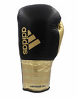 Single black and gold adidas Adi-Power Hybrid 500 Pro Boxing Glove.