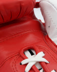 Close-up of red and white boxing glove from adidas Adi-Power Hybrid 500.