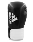 Black and white adidas Hybrid 65 boxing glove.