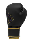 Black and gold boxing glove, Adidas Hybrid 80 Training Gloves.