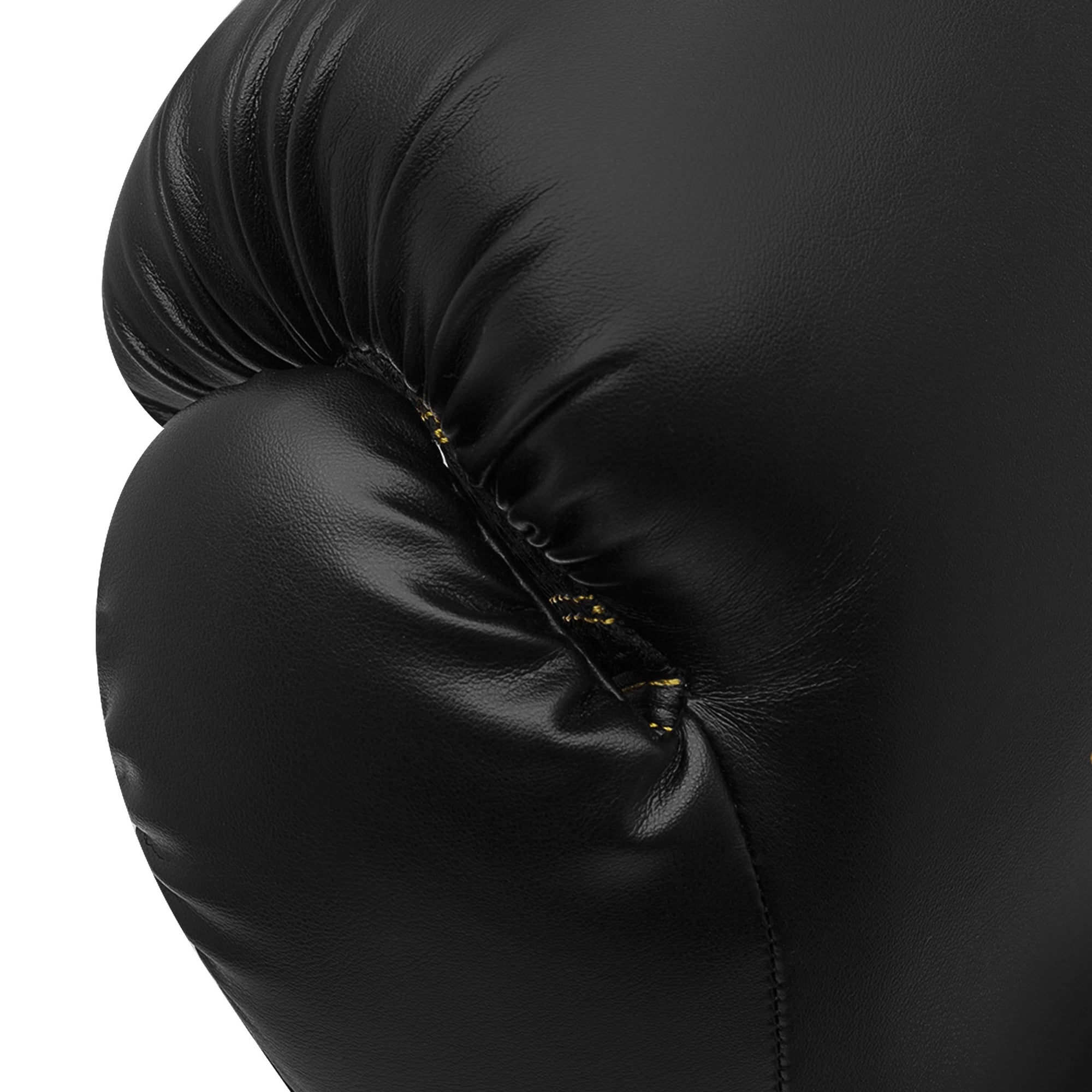 A black boxing glove designed for boxing training.