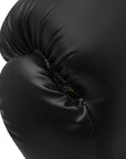 A black boxing glove designed for boxing training.