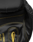 Black and yellow boxing glove for training purposes.