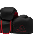 Black and red boxing gloves, Adidas Hybrid 80, 12 oz.