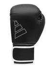 Black boxing glove with white trim, Adidas Hybrid 80 Training.