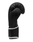 Black boxing glove with white trim by Adidas.