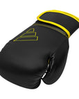 Black and yellow Adidas Hybrid 80 boxing glove.