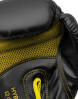 Black and yellow Adidas Hybrid 80 Training boxing glove close-up.