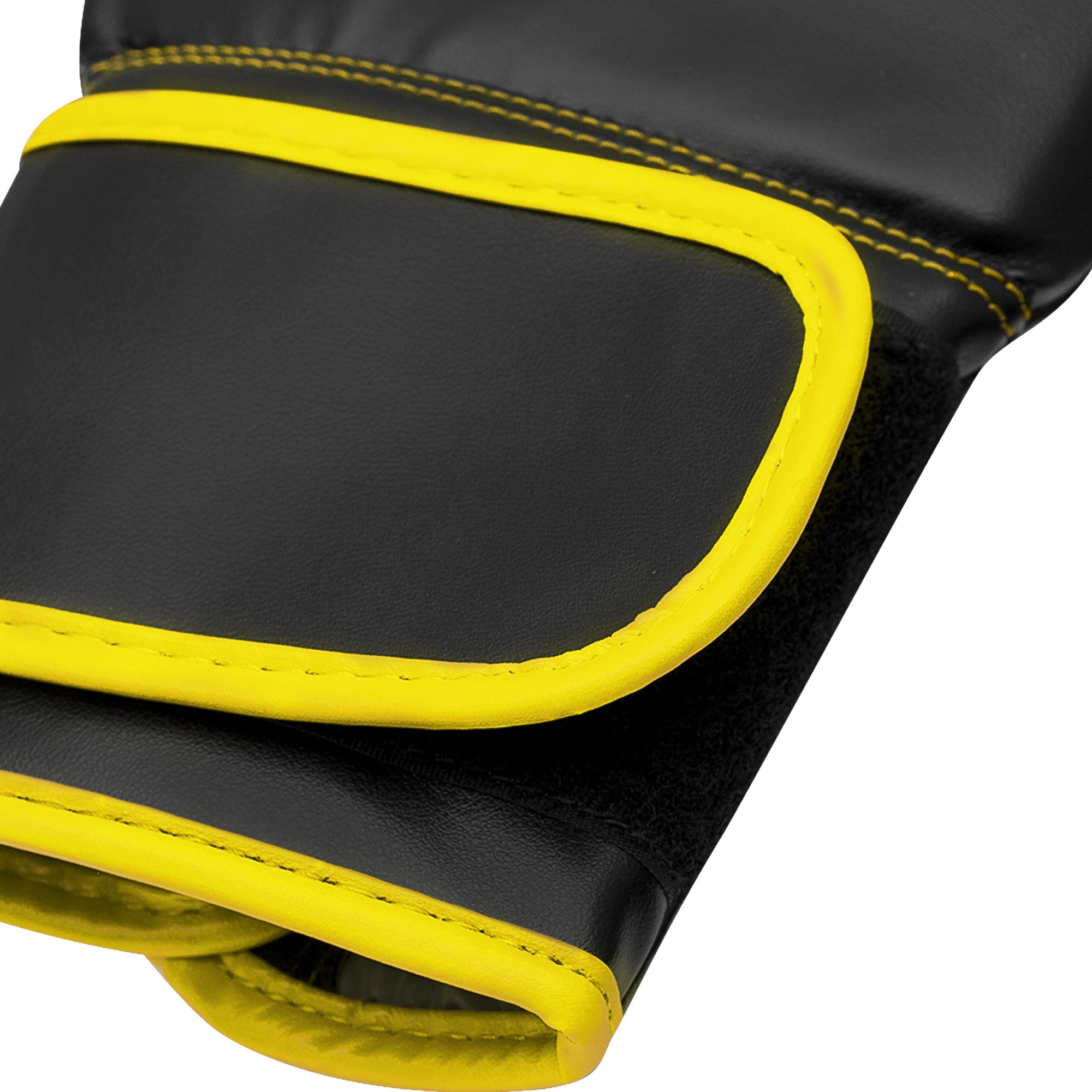 Black and yellow Adidas Hybrid 80 Training boxing glove close-up.