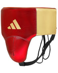 A red and gold boxing helmet displayed prominently.