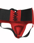 Red and black men's groin guard, boxing protector.