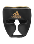 Black and gold boxing head guard for men and women, size M.