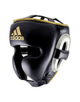 Black and gold boxing helmet for men and women, size L.