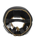 A black helmet with gold trim designed for boxing protection.