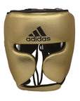 Gold boxing helmet with black straps, adidas adiStar Pro.