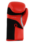 Red and black boxing glove, Adidas Speed 100 model in solar red color, 14 oz weight.