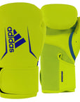 Pair of boxing gloves, Adidas Speed 100 in solar yellow and dark blue color.