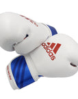 Pair of Adidas boxing gloves in white, blue, and red, 18 oz.