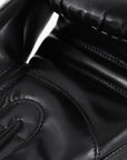 Close-up of a black adidas boxing glove.