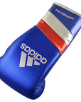 A blue boxing glove with silver and red stripes from adidas Adi-Speed 500.