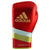 Red boxing glove with gold stripes, adidas Adi-Speed 500 Pro.