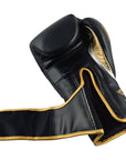 Black and gold adidas boxing glove, 8 oz, for men and women.