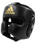 Boxing helmet in black with a gold Adidas logo.