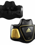 Black and gold Adidas chest protector for boxing.