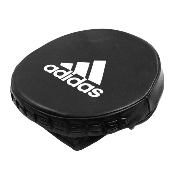 Black round object with adidas logo.