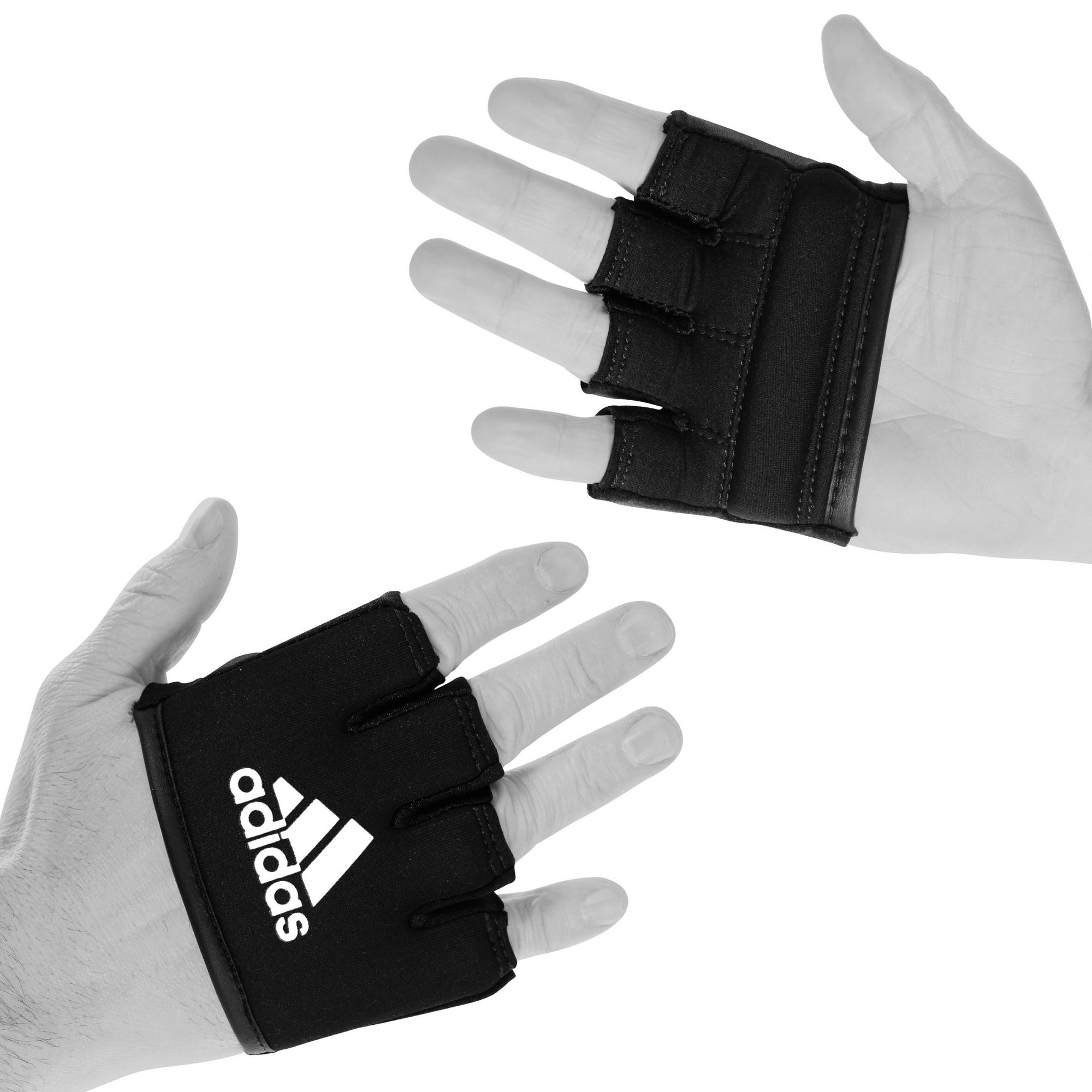 Pair of hands with black boxing gloves for knuckle protection.