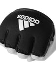 Black and white adidas boxing glove for knuckle protection.