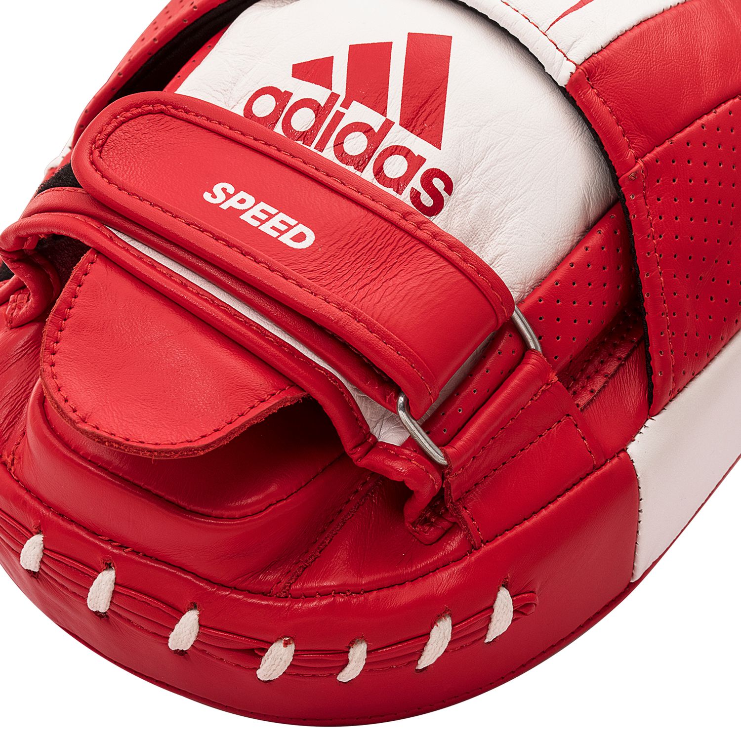 Close-up of red and white boxing glove by Adidas.