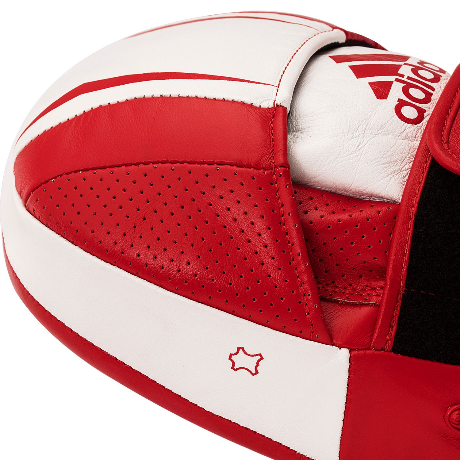 Close-up of Adidas red and white boxing glove.