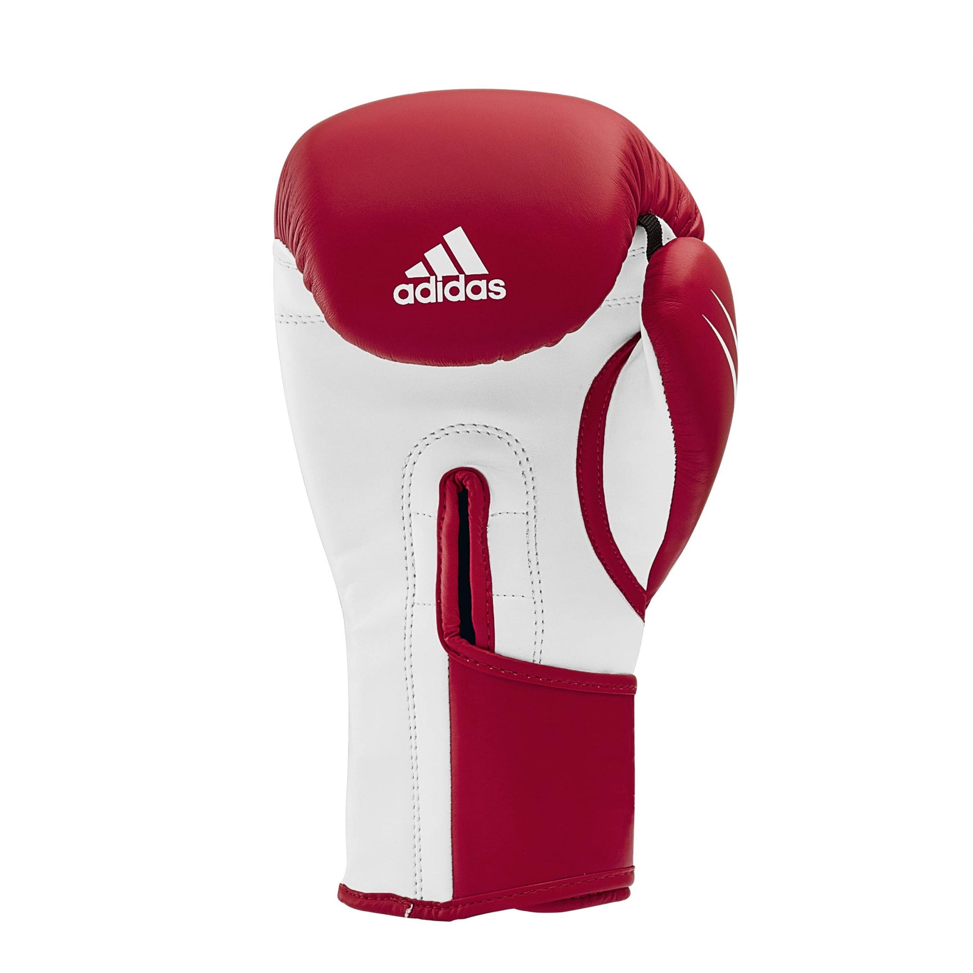 Single red and white boxing glove for training.