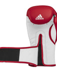 Red and white boxing glove for training.