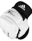 White and black Adidas boxing glove on a white background.