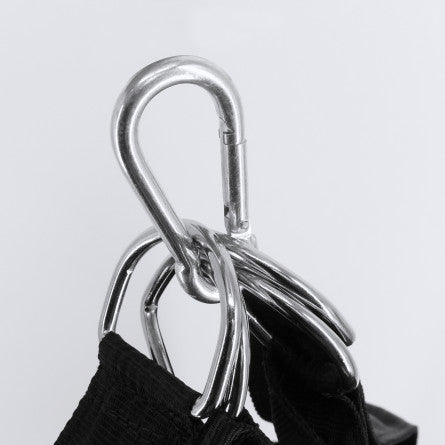 Close-up of black fabric on a boxing training bag.