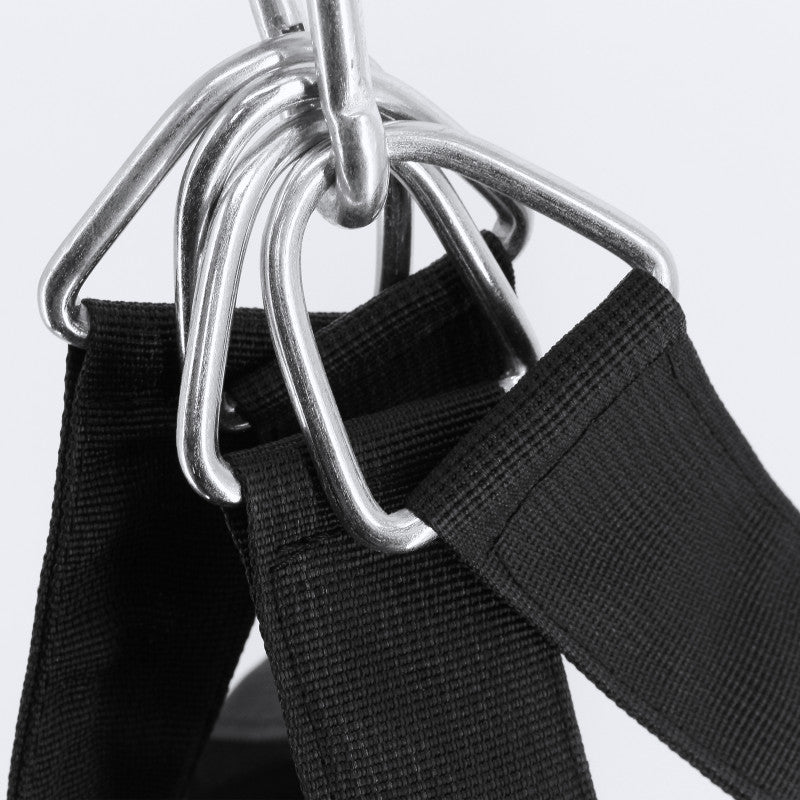 Black straps with metal rings for boxing equipment support.